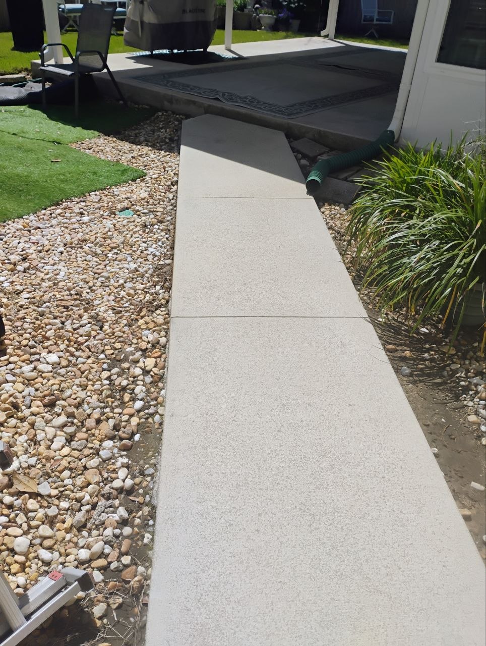 Expert Pressure Washing Revives Concrete Walkway in Pensacola