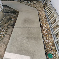 Expert-Pressure-Washing-Revives-Concrete-Walkway-in-Pensacola 0