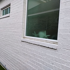 House-Soft-Wash-Driveway-Cleaning-Transformation-in-Pensacola-FL 1