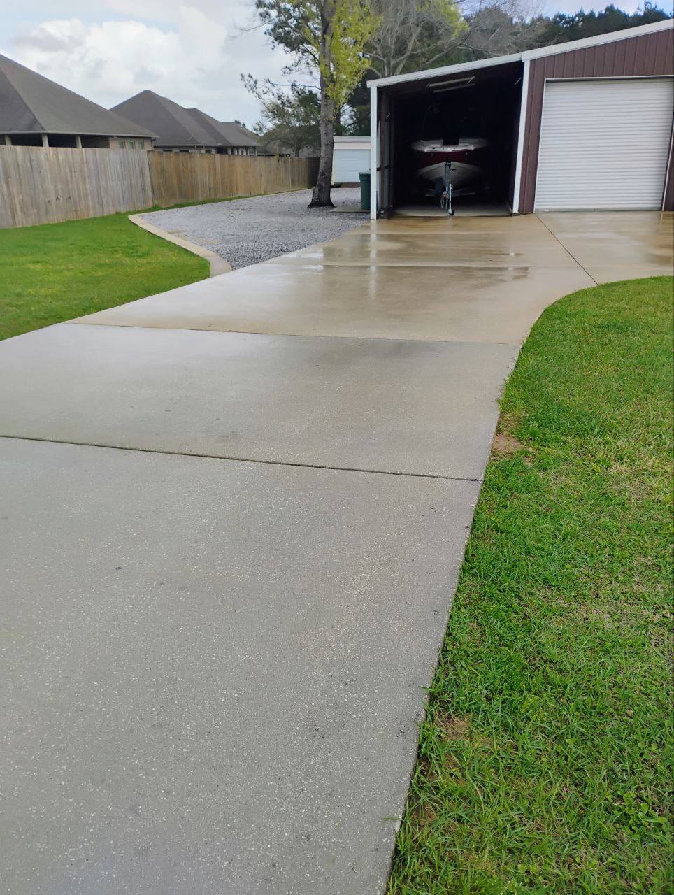 Professional Driveway Cleaning Service Completed in Pensacola, FL Eliminating Oil Stains and Deep-Set Grime